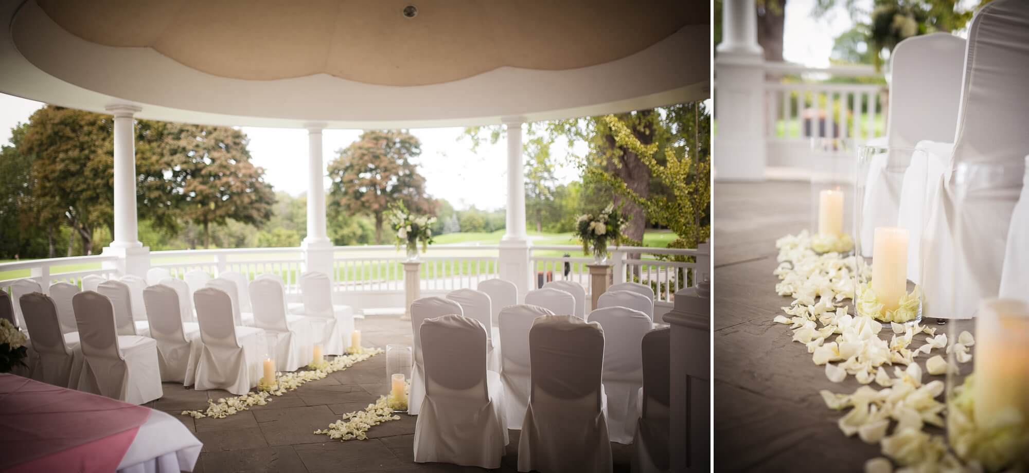 Details of the outdoor ceremony, with a flower and candle aisle at Lambton Golf & Country Club