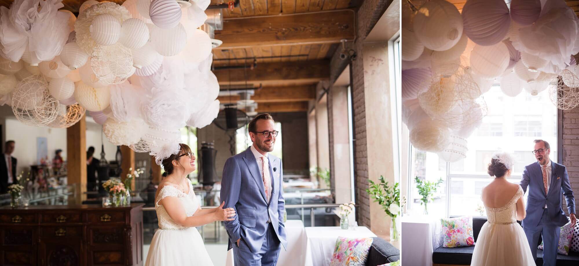 The bride and groom surrounded by their DIY decors, seeing each other for the first time at Hotel Ocho, Toronto