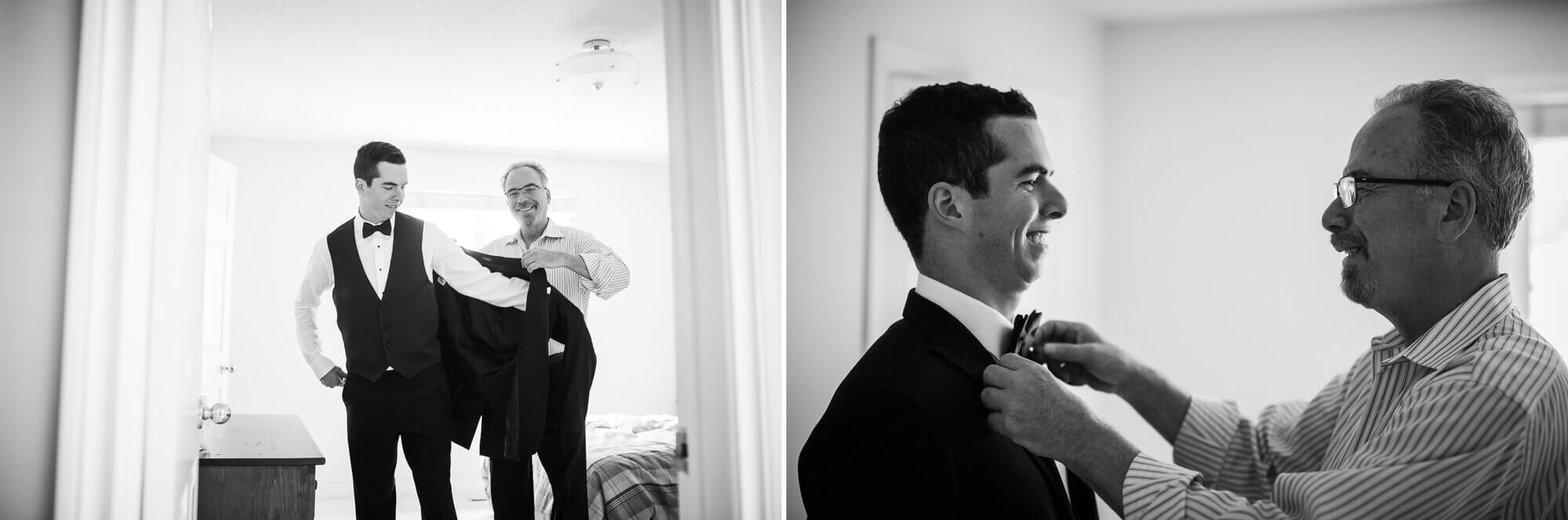 Getting ready shoot of the groom getting his suit and tie done up.