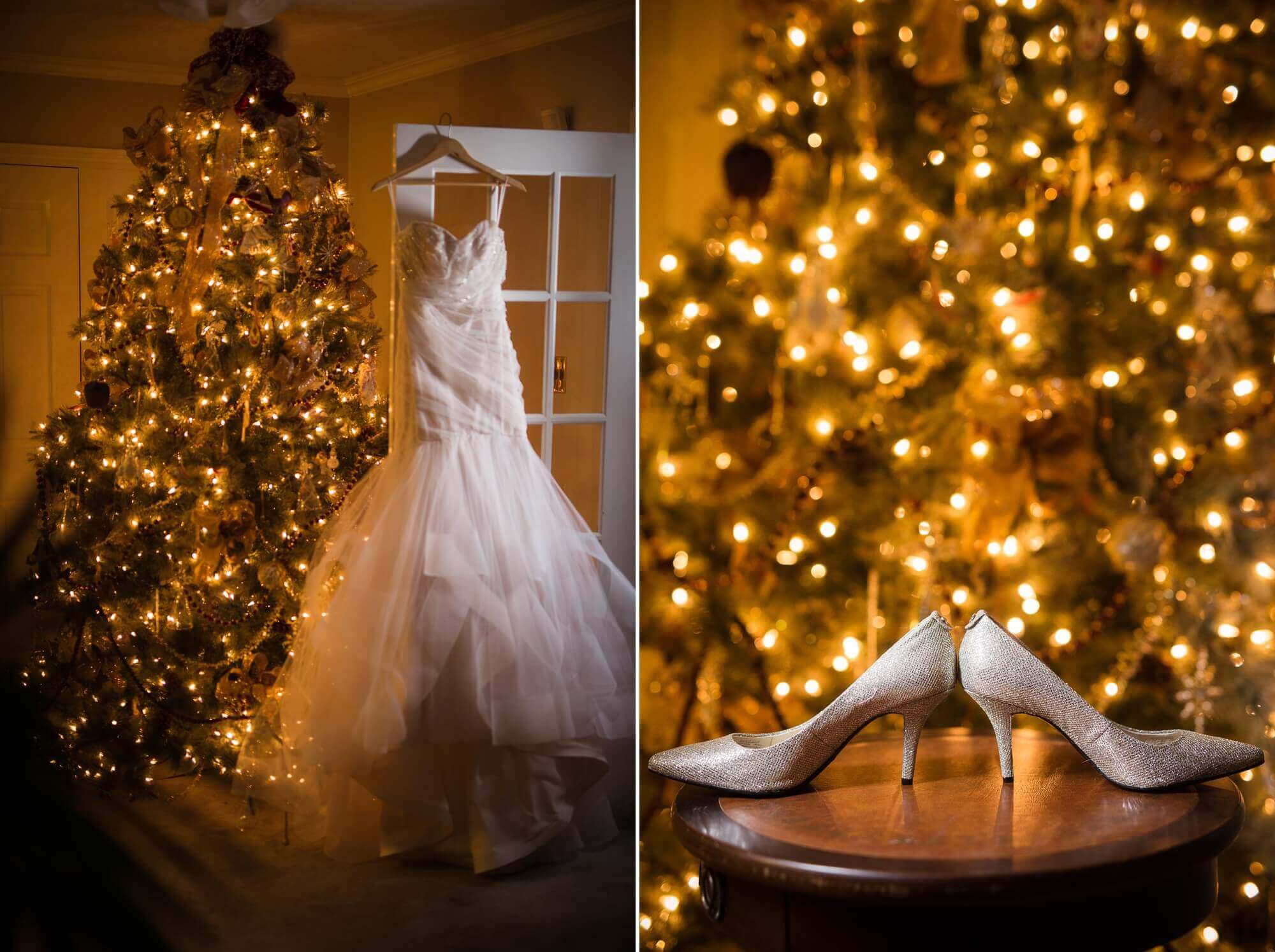 The bride's white wedding dress and white high heels illuminated in front of the Christmas tree in a Toronto home