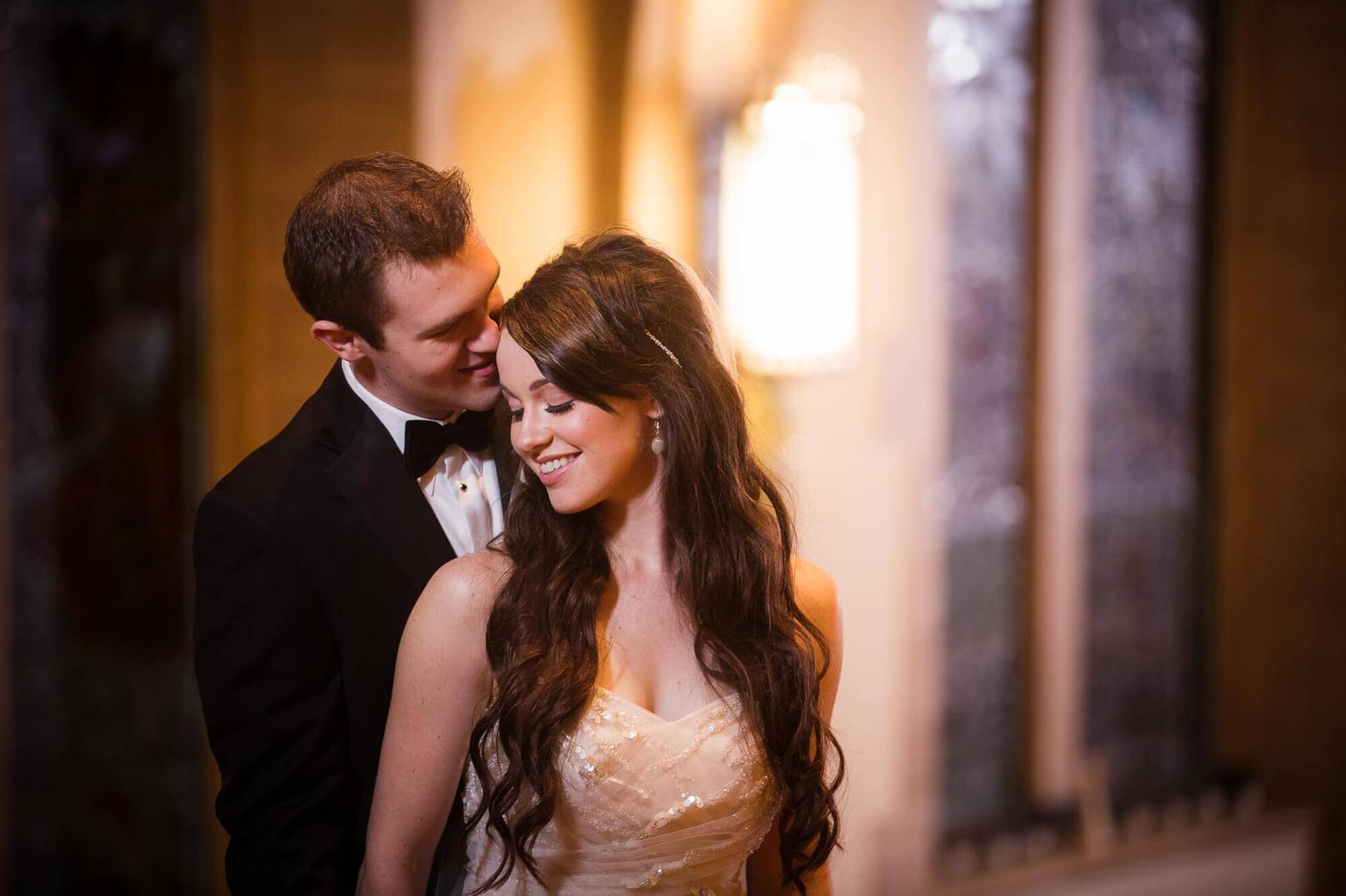 Intimate portrait of the bride leaning into her groom at the Rosedale United Church in Toronto