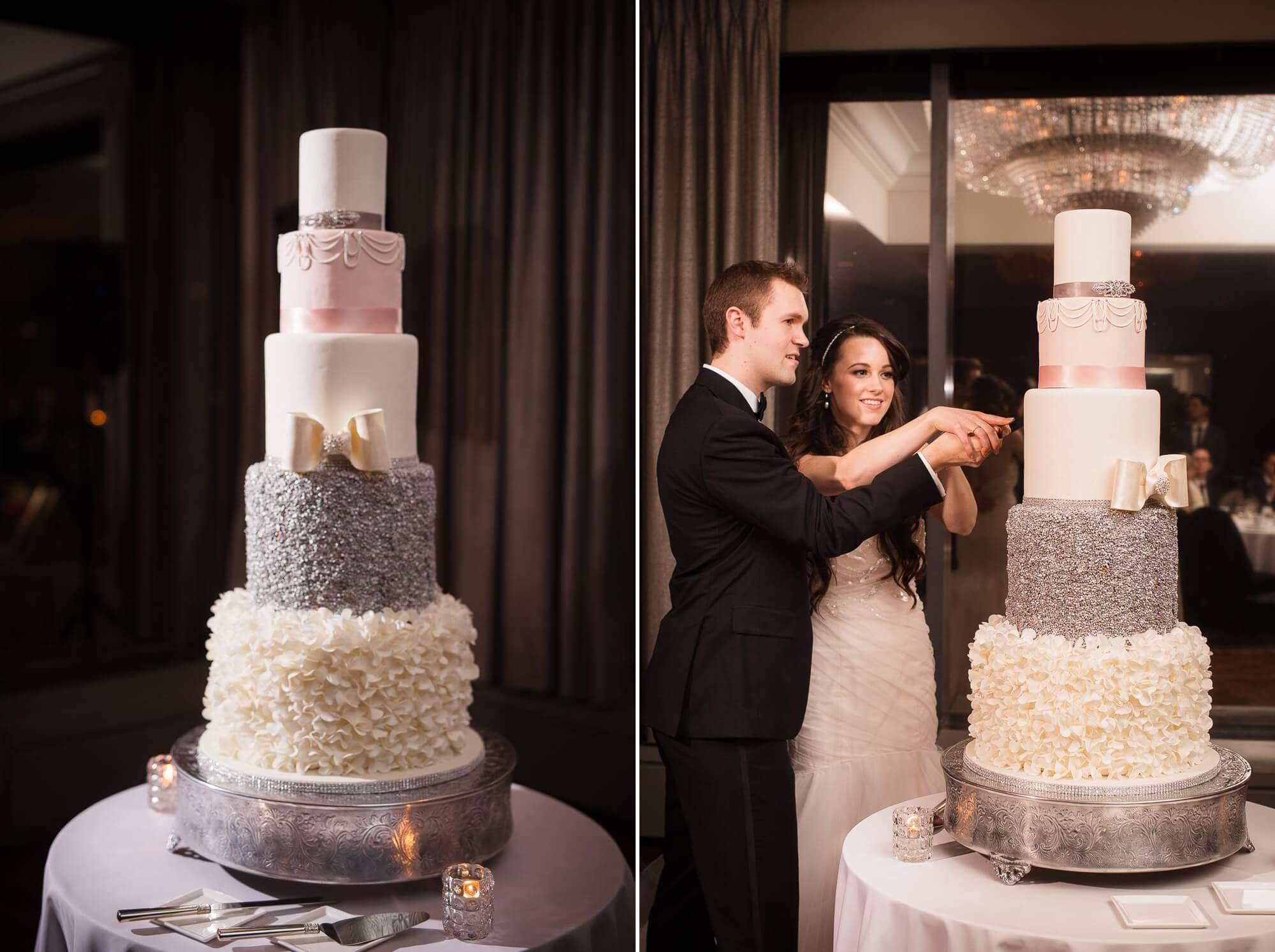Details of the large 5 tier wedding cake as the bride and groom take their first slice at the Fairmont Royal York, Toronto 