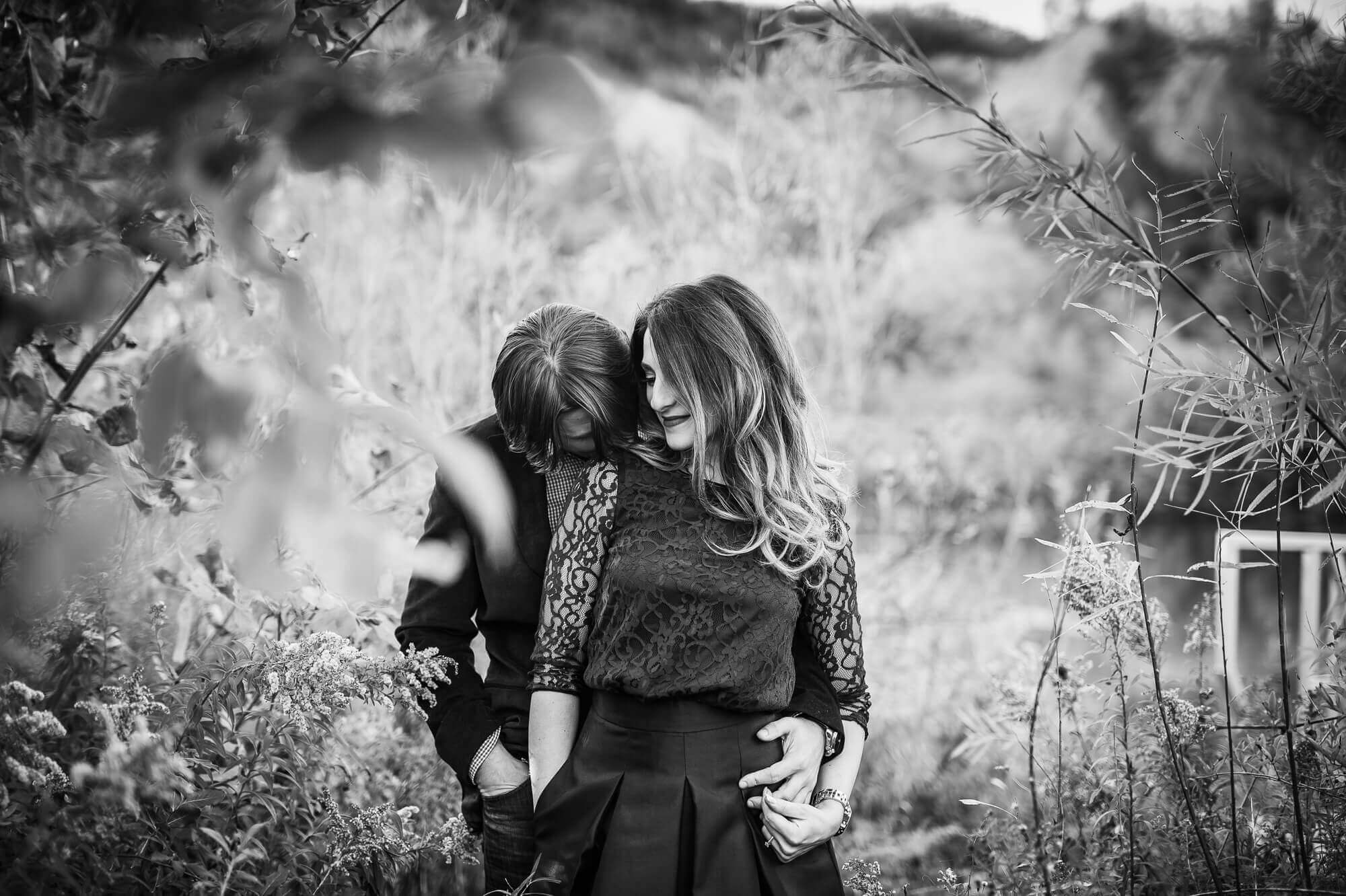 Beautiful black and white intimate portraits for an engagement shoot at Scarborough Bluffs in Toronto