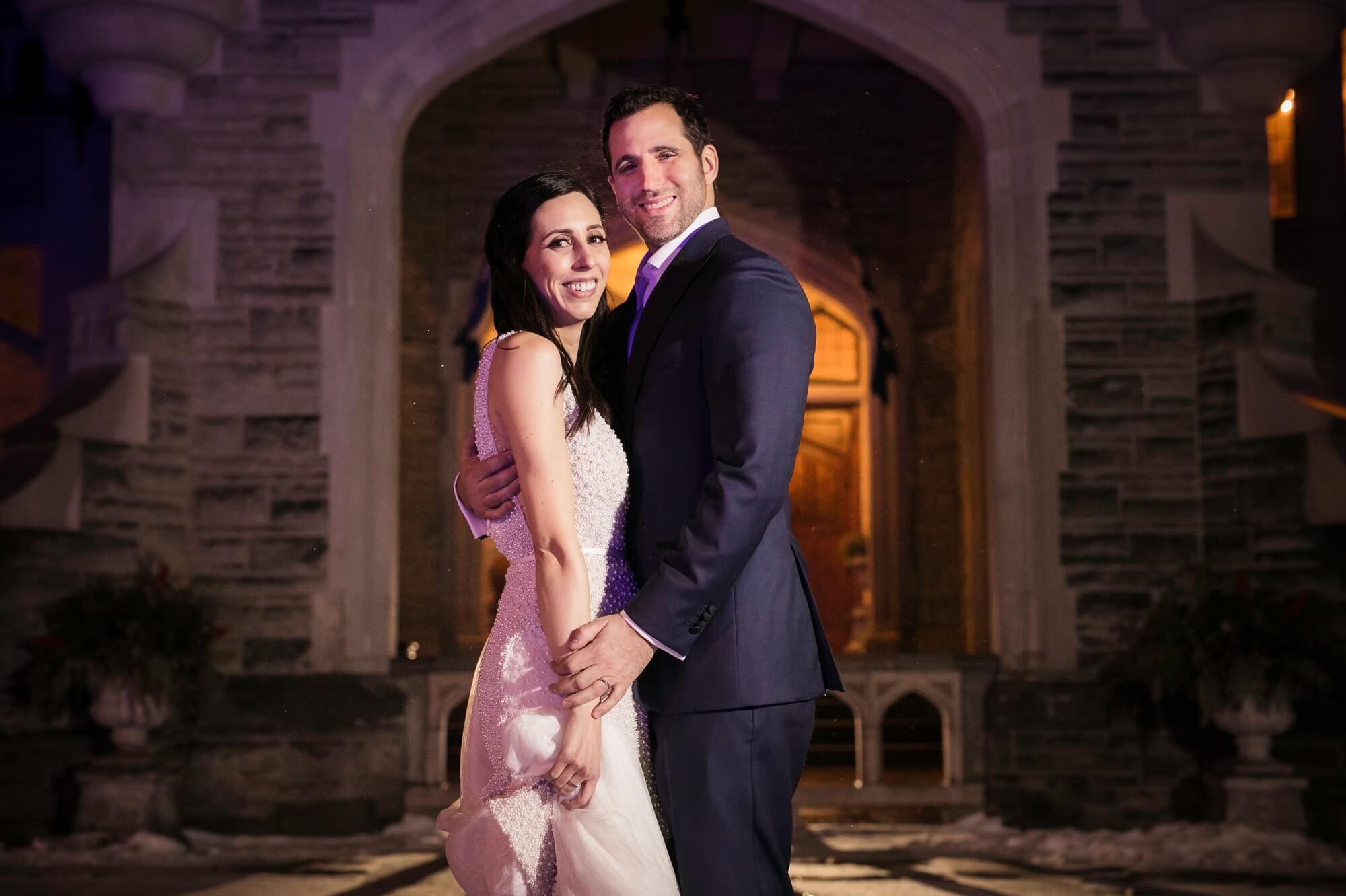Dramatic Portrait of the Bride and Groom outside of Casa Loma in Toronto