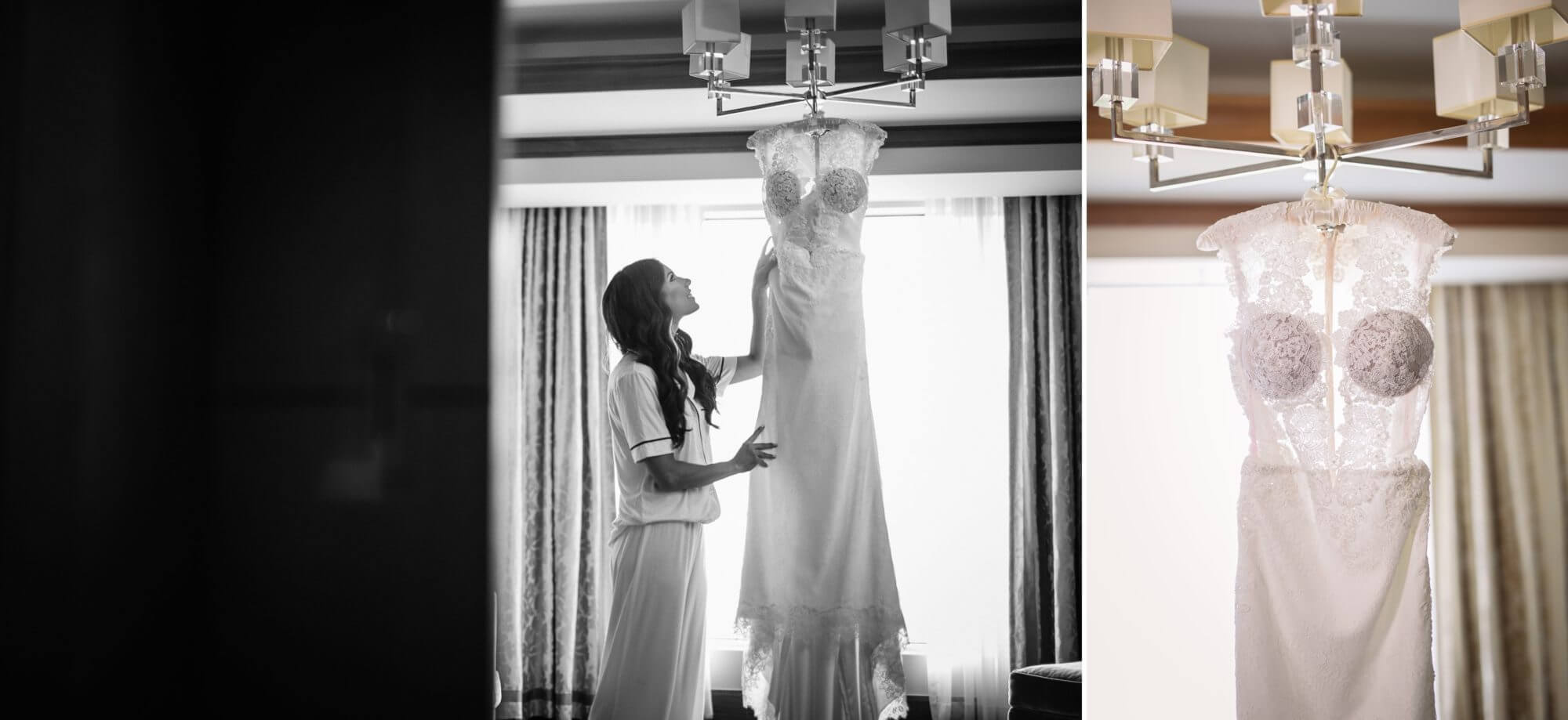The bride's dress elegantly hangs from the chandelier at The Ritz-Carleton, Toronto